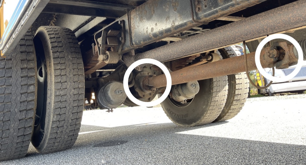 a universal joint under a school bus